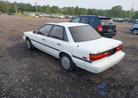 1988 Toyota Camry Le z USA, uszkodzony, nr VIN JT2SV22E5J3248025
